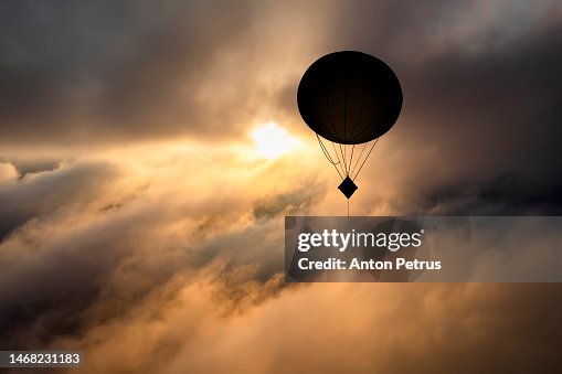 Military Balloon with a corner reflector in the sky. Military Balloon with a corner reflector in the sky.