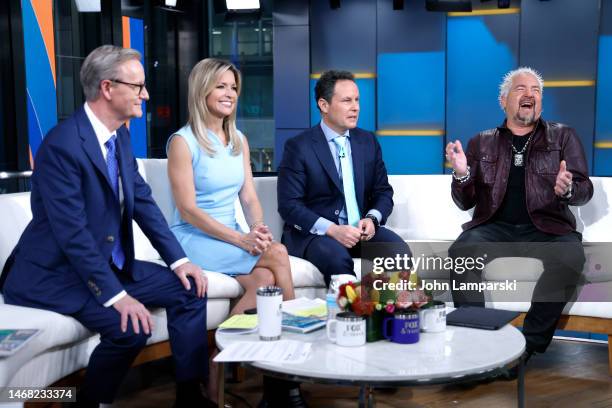 Fox anchors Steve Doocy, Ainsley Earhardt and Brian Kilmeade interview restaurateur Guy Ramsay Fieri attends "Fox & Friends" at Fox News studios on...