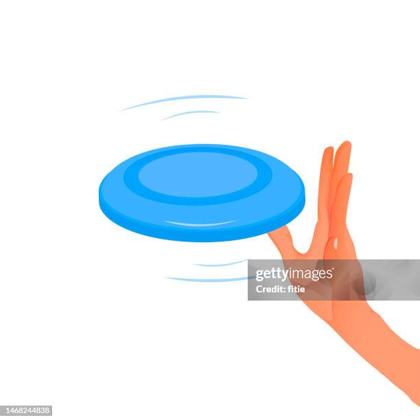 hand holding  frisbee outside. flaying frisbee outdoors  in white background - flying disc stock illustrations