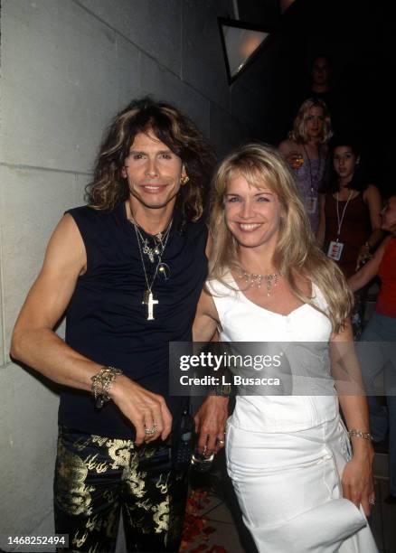 American singer Steven Tyler of American rock band Aerosmith with wife Teresa Barrick attend the 1999 MTV Video Music Awards party thrown by Virging...