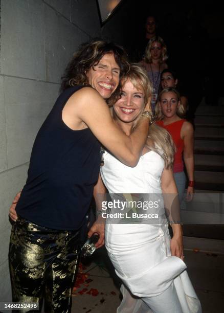 American singer Steven Tyler of American rock band Aerosmith with wife Teresa Barrick attend the 1999 MTV Video Music Awards party thrown by Virging...
