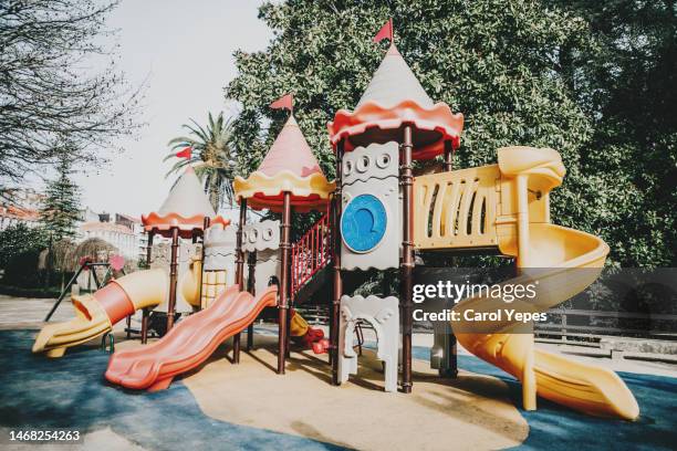 colorful kids outdoor playground equipment with slides - jungle gym stock pictures, royalty-free photos & images