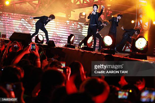 Members of "MBLAQ", a K-pop band from South Korea, perform at the Music Bank K-pop festival concert in Hong Kong on June 23, 2012. Popular South...