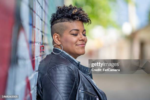 portrait of a yung woman - fat lesbian stockfoto's en -beelden