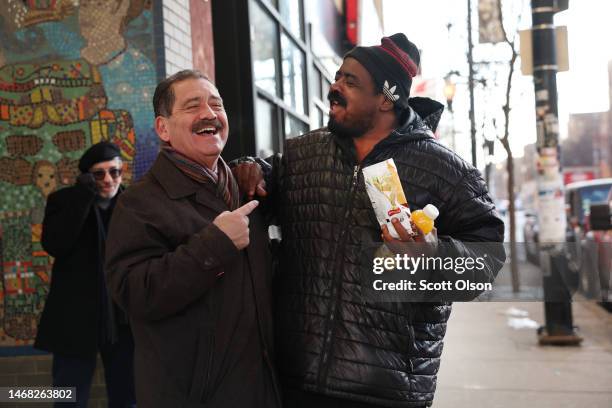 Chicago mayoral candidate Congressman Jesus "Chuy" Garcia greets commuters at an 'L' station during an early-morning campaign stop in the Pilsen...