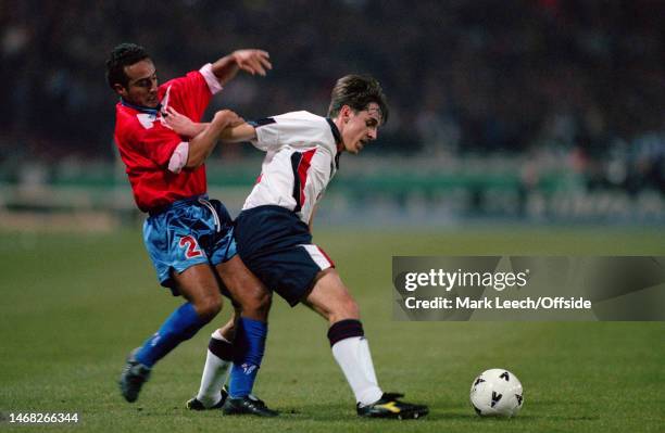 February 1998, London - International Football - England v Chile - Gary Neville of England holds off Rodrigo Barrera of Chile.