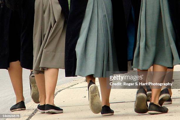canvas sneakers - amish women stock pictures, royalty-free photos & images