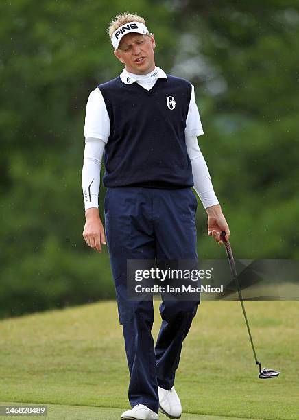 Simon Wakefield of England reacts to a missed putt during the 2012 Scottish Hydro Challenge - Day Three at The Macdonald Spey Valley Golf Course on...