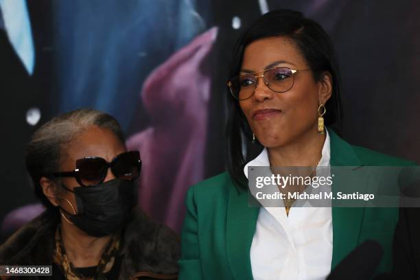 The daughters of Malcolm X Qubilah Shabazz and Ilyasah Shabazz listen as Civil rights attorney Ben Crump speaks during a press conference at the...