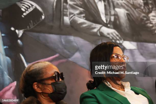 The daughters of Malcolm X, Qubilah Shabazz and Ilyasah Shabazz listen as Civil rights attorney Ben Crump speaks during a press conference at the...