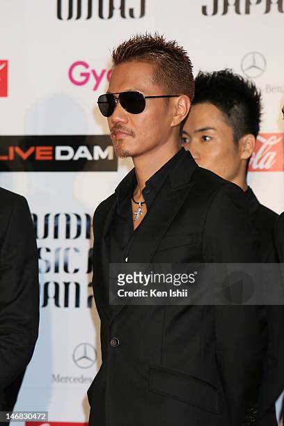 Poses for photographs on the red carpet of the MTV Video Music Awards Japan 2012 at Makuhari Messe on June 23, 2012 in Chiba, Japan.