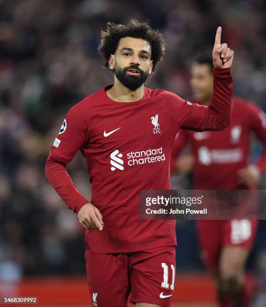 Mohamed Salah of Liverpool celebrates after scoring the second goal during the UEFA Champions League round of 16 leg one match between Liverpool FC...