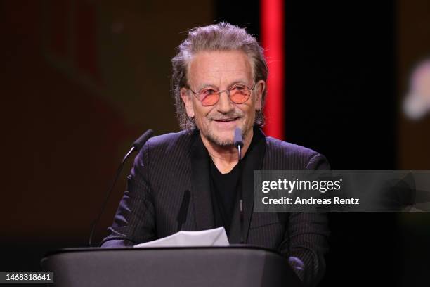 Singer and frontman Bono speaks on stage at the "The Fabelmans" premiere & Honorary Golden Bear and homage for Steven Spielberg during the 73rd...