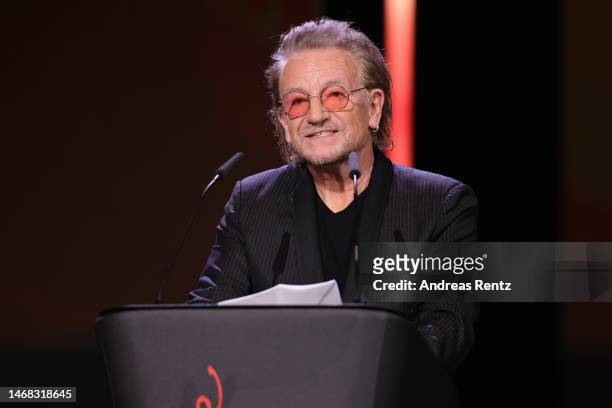 Singer and frontman Bono speaks on stage at the "The Fabelmans" premiere & Honorary Golden Bear and homage for Steven Spielberg during the 73rd...