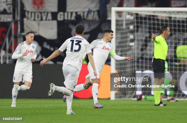 Giovanni Di Lorenzo of SSC Napoli celebrates after scoring the team's second goal with teammates during the UEFA Champions League round of 16 leg one...