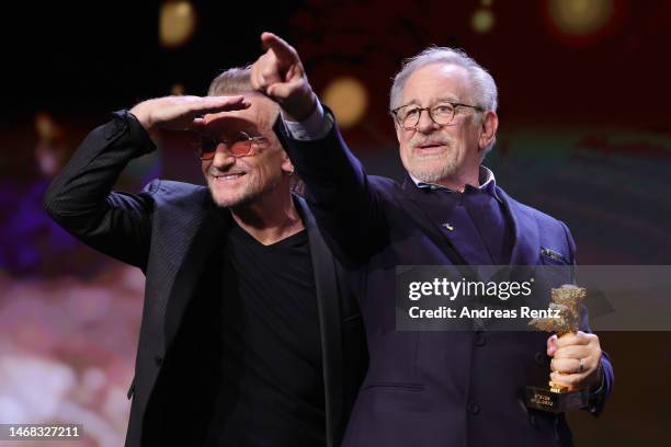 Steven Spielberg and U2 singer and frontman Bono seen on stage at the "The Fabelmans" premiere & Honorary Golden Bear and homage for Steven Spielberg...