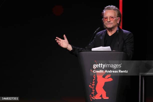 Singer and frontman Bono speaks on stage at the "The Fabelmans" premiere & Honorary Golden Bear and homage for Steven Spielberg during the 73rd...