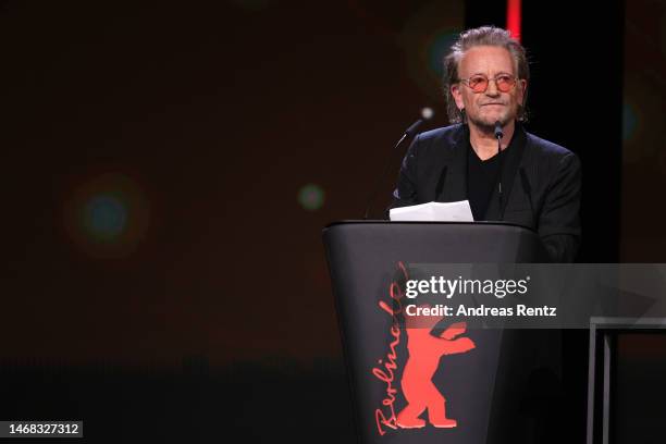 Singer and frontman Bono speaks on stage at the "The Fabelmans" premiere & Honorary Golden Bear and homage for Steven Spielberg during the 73rd...