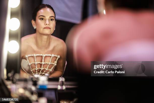 Lily James backstage during the EE BAFTA Film Awards 2023 at The Royal Festival Hall on February 19, 2023 in London, England.