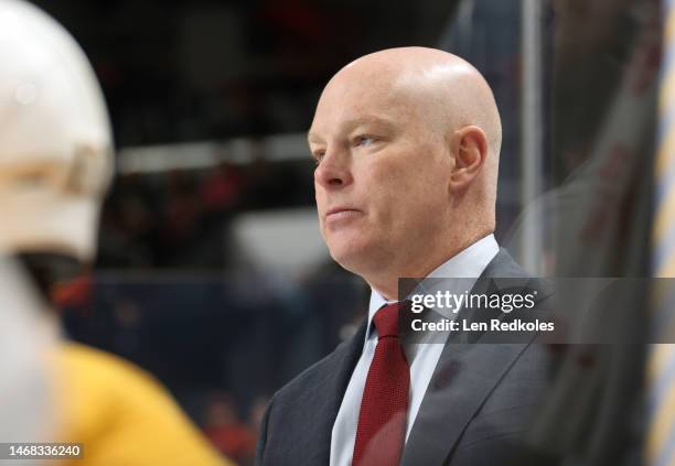 Head Coach of the Nashville Predators John Hynes watches the play on the ice during the first period against the Philadelphia Flyers at the Wells...