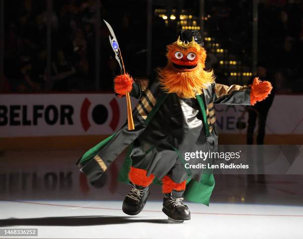 Gritty the mascot of the Philadelphia Flyers skates onto the ice prior to an NHL game against the Nashville Predators at the Wells Fargo Center on...