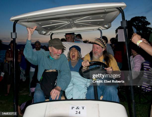 Pete Seeger and his wife Toshi Seeger leave the Clearwater Festival in front of the Hudson River in Croton Point Park in Croton-on-Hudson, New York...