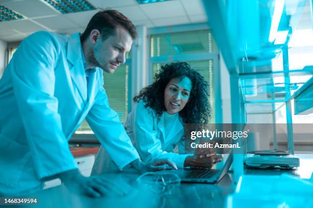 waiting for the final results of a scientific experiment - epidemiology research stock pictures, royalty-free photos & images