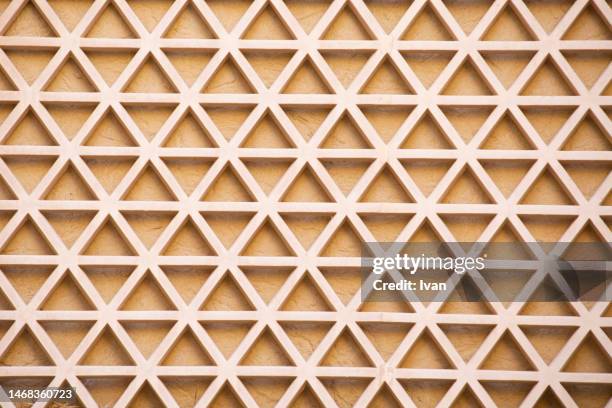 full frame of texture, clay repeatedly triangle pattern - trapezoid stock pictures, royalty-free photos & images