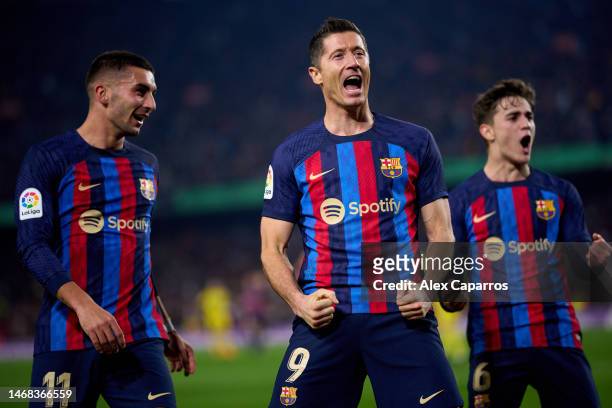 Robert Lewandowski of FC Barcelona celebrates with his teammates after scoring his team's second goal during the LaLiga Santander match between FC...