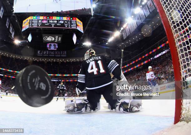 Nick Suzuki of the Montreal Canadiens scores against Vitek Vanecek of the New Jersey Devils at 3:42 of the second period at the Prudential Center on...