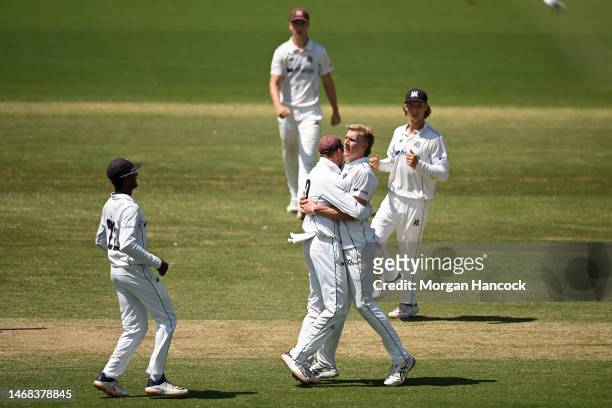 Will Sutherland of Victoria celebrates with Matt Short of Victoria after dismissing Daniel Drew of South Australia during the Sheffield Shield match...