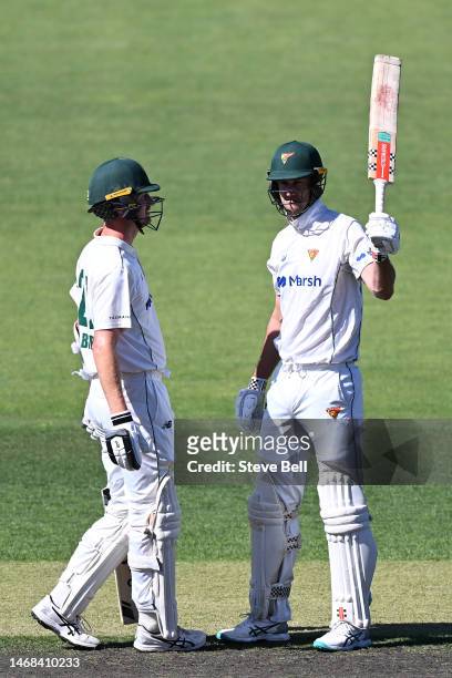 Beau Webster of the Tigers celebrates scoring a half century during the Sheffield Shield match between Tasmania and Western Australia at Blundstone...