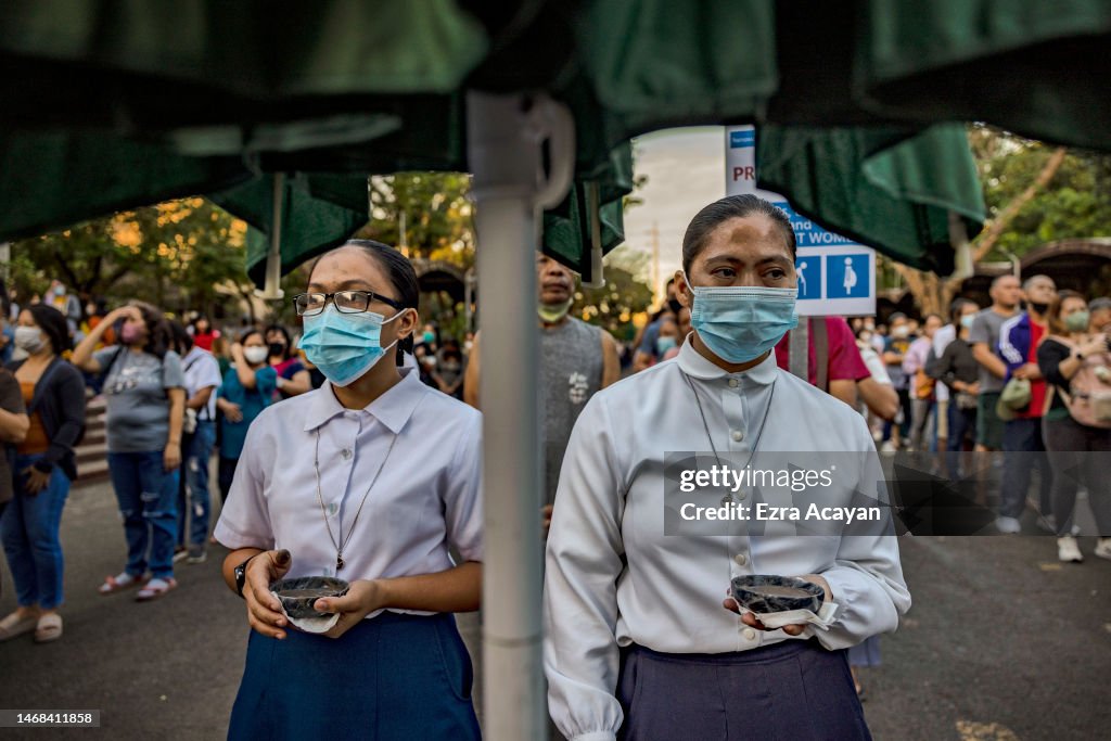 Pinoy Layup Lay ministers prepare to give ash to Filipino Catholics as they... News ...