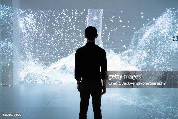 man in virtual reality - virtual museum stock pictures, royalty-free photos & images