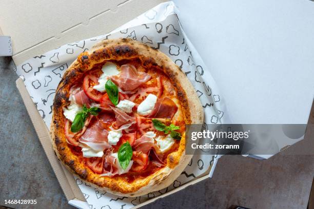 pizza in open box for delivery - prosciutto package stock pictures, royalty-free photos & images