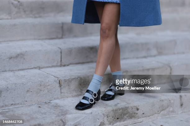 Beka Prance seen wearing a blue coat, a blue blouse, blue socks, black shoes and a matching blue skirt before the PAUL and JOE show during London...
