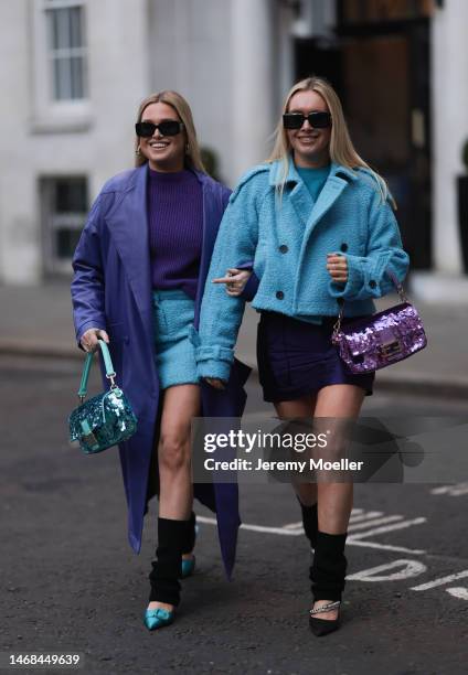 Olivia and Alice seen wearing dark shades by Versace, a sequins baguette by Fendi, a purple long leather coat, a purple sweater and a baby blue...