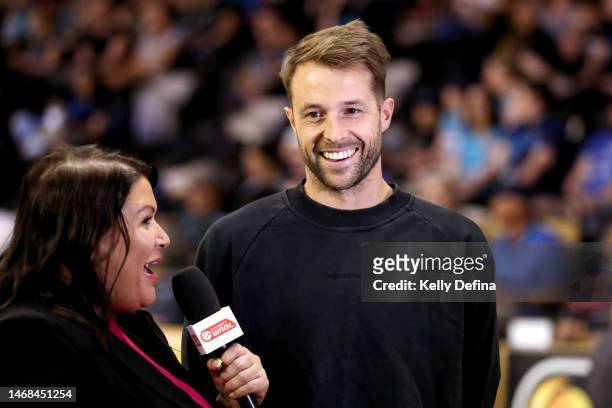Nathan Sobey of the Brisbane Bullets is interviewed during the round 15 WNBL match between Southside Flyers and Melbourne Boomers at State Basketball...