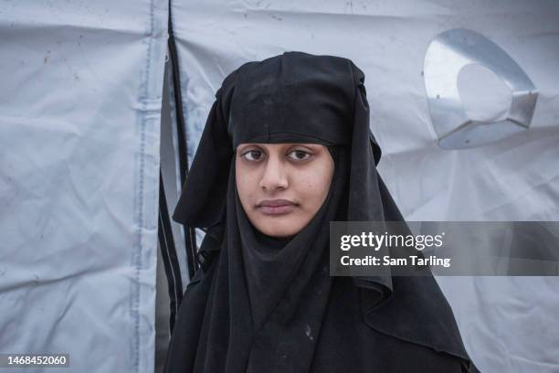 British-born Shemima Begum from Bethnal Green in London, stands outside the tent in which she's currently living with her newborn son at a detainment...