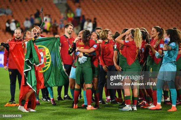 Portugal celebrate victory and qualification for the 2023 FIFA Women's World Cup during the 2023 FIFA World Cup Play Off Tournament match between...