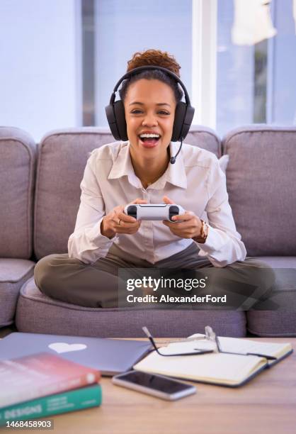 gaming, headphones and portrait of black woman or streamer on sofa for video game and fun study break. gen z cyberpunk gamer or usa person winning esports competition on technology console and lounge - z com stock pictures, royalty-free photos & images