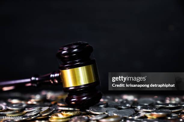 coin with hammer,money concept - justice reform stock pictures, royalty-free photos & images