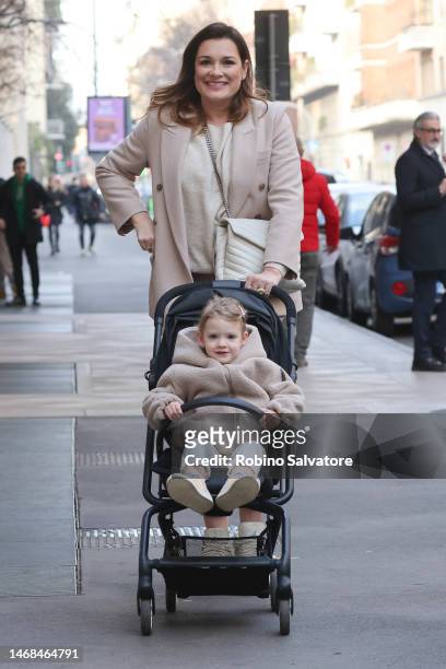 Alena Seredova and daughter Charlotte are seen during the Milan Fashion Week Womenswear Fall/Winter 2023/2024 on February 21, 2023 in Milan, Italy.