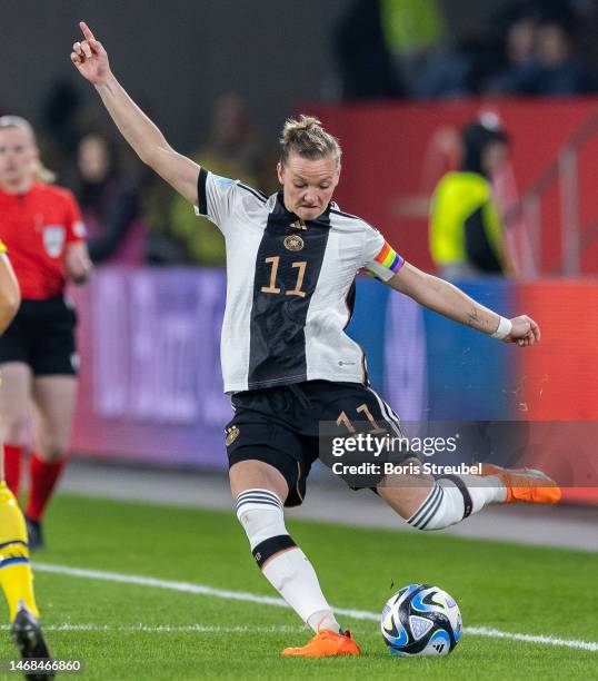 Alexandra Popp of Germany takes a shot during the Women's friendly match between Germany and Sweden at Schauinsland-Reisen-Arena on February 21, 2023...