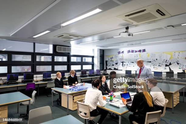 learning in a smaller class - classroom wide angle stock pictures, royalty-free photos & images