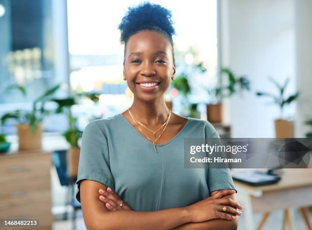 black woman in business, face and success, professional mindset and happy with career goals. corporate vision, boss in workplace and leadership with smile, portrait in modern office with arms crossed - portrait blurred background stockfoto's en -beelden