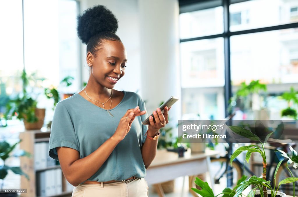 Black woman, phone and typing in office for contact, data management app and reading business notification. Happy female worker, smartphone and mobile connection for networking, technology and media