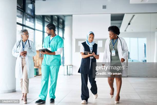 walking, talking and doctors, nurses or hospital internship people for medical advice, management or workflow. communication, teamwork of diversity group or healthcare worker planning clinic solution - group women support doctor stock pictures, royalty-free photos & images