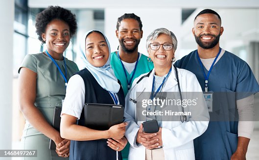 Portrait, diversity and happy team of doctors with teamwork excited, positive and proud in a hospital or clinic. Group, healthcare professional and medicine or medical experts in unity together