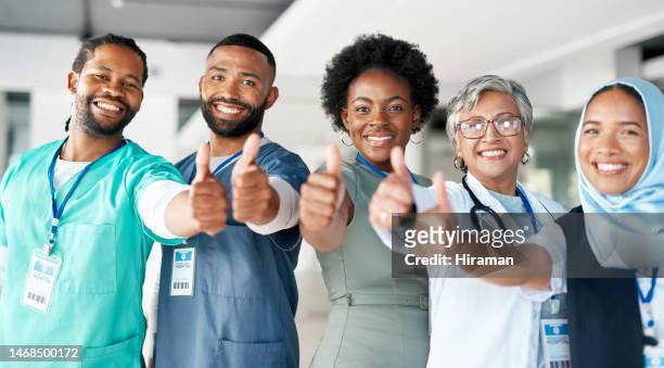 doctor, team and thumbs up for thank you, good job or success in healthcare services at the hospital. portrait of happy medical professionals showing thumb emoji for winning, yes or support in trust - thank you smile stock pictures, royalty-free photos & images
